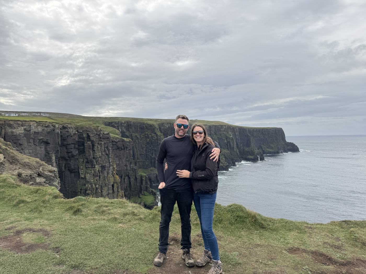 Nick and Dariece standing at the Cliffs of Moher in County Clare